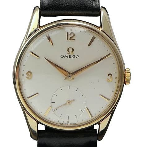 omega 9ct gold men's watch.